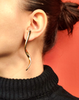 Orecchini linea fluida