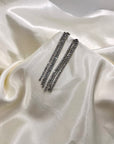 Orecchino cascata strass triplo filo